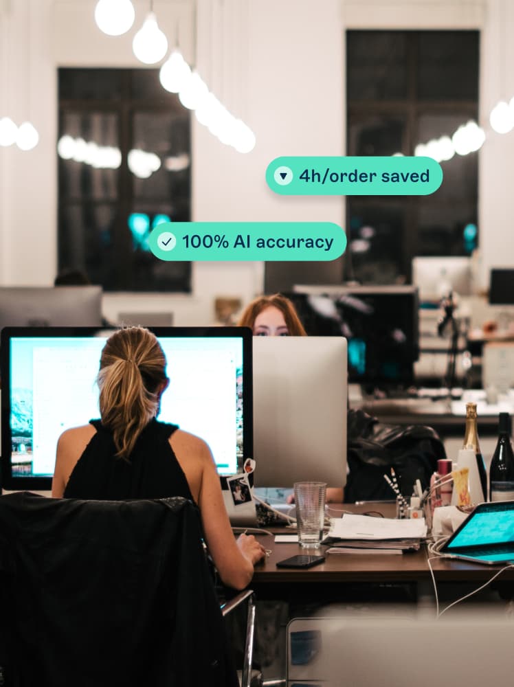&why: office situation with two women working, design elements on top